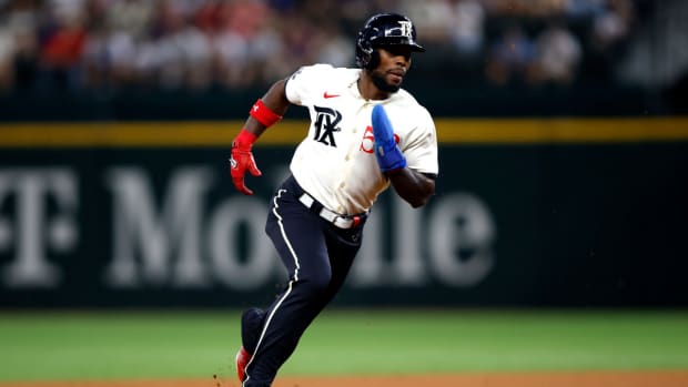 Sep 2, 2023; Arlington, Texas, USA; Texas Rangers left fielder J.P. Martinez (50) runs to third base in the fourth inning against the Minnesota Twins at Globe Life Field.